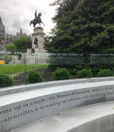 The Womens Monument—Voices from the Garden—at the Virginia capitol with the founding mens original statues in the background